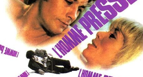 Афиш на филма „L’homme pressé“ (Забързаният), 1977 г. с участието на Ален Делон и Мирей Дарк, режисьор Едуар Молинаро.